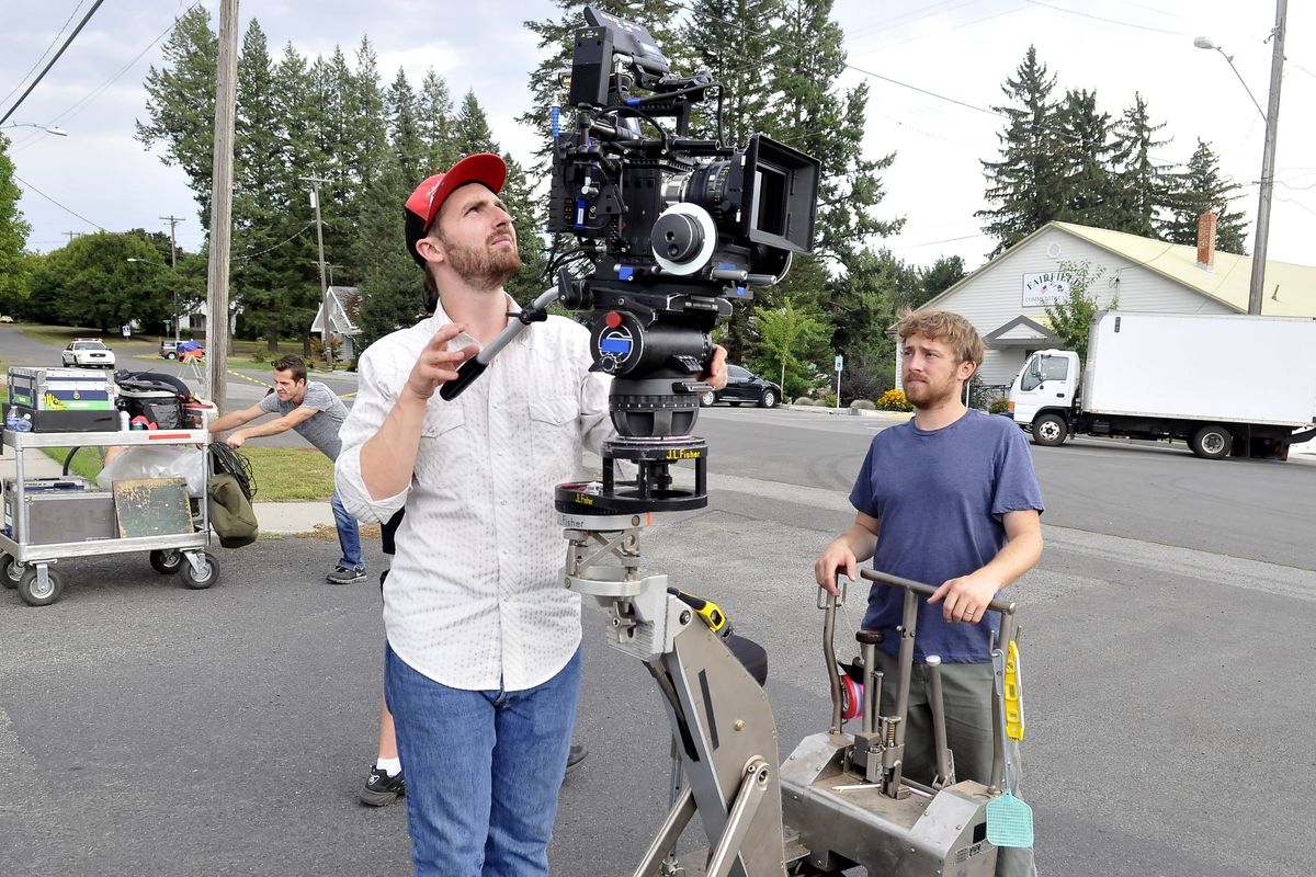 T.J. Williams Jr., the director of photography, frames up a shot with a digital movie camera in Fairfield, on Wednesday, while shooting a feature film assisted by North By Northwest. At right is Adam Miller, the first assistant camera operator. (Jesse Tinsley)