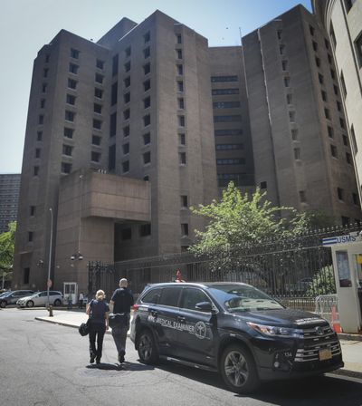 New York City medical examiner personnel leave their vehicle and walk to the Manhattan Correctional Center where financier Jeffrey Epstein died by suicide while awaiting trial on sex-trafficking charges, Saturday Aug. 10, 2019, in New York. Epstein was found in his cell at the facility Saturday morning, according to the officials, who was briefed on the matter but spoke on condition of anonymity because he wasn't authorized to discuss it publicly. The medical examiner's office in Manhattan confirmed Epstein's death. (Bebeto Matthews / AP)