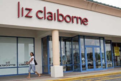 
A shopper leaves a Liz Claiborne store Wednesday in Riverhead, N.Y. Liz Claiborne Inc.  will slash 600 to 800 jobs as part of its plan to restructure.Associated Press
 (Associated Press / The Spokesman-Review)