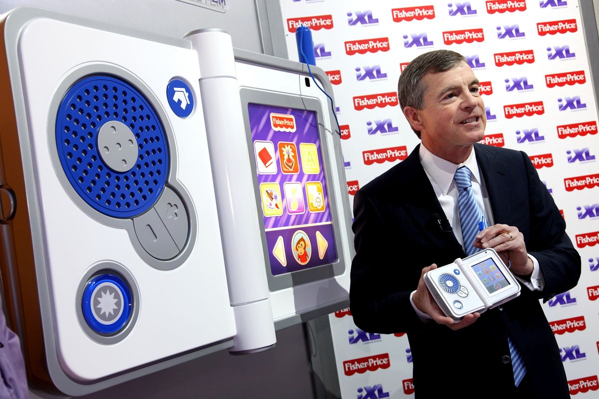 Robert Eckert, chief executive officer of Mattel Inc., holds the Fisher-Price iXL that he introduced during Toy Fair 2010 at New York’s Javits Center Monday. The iXL children’s interactive device is Eckert’s personal pick for the hottest toy of the 2010 holiday season.