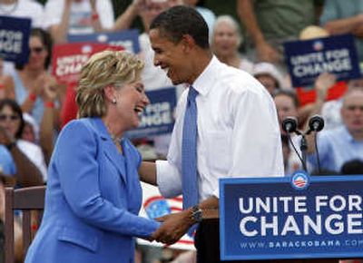 
Sen. Barack Obama, D-Ill., laughs with Sen. Hillary Rodham Clinton, D-N.Y., at a campaign event in Unity, N.H., on Friday.Associated Press
 (Associated Press / The Spokesman-Review)