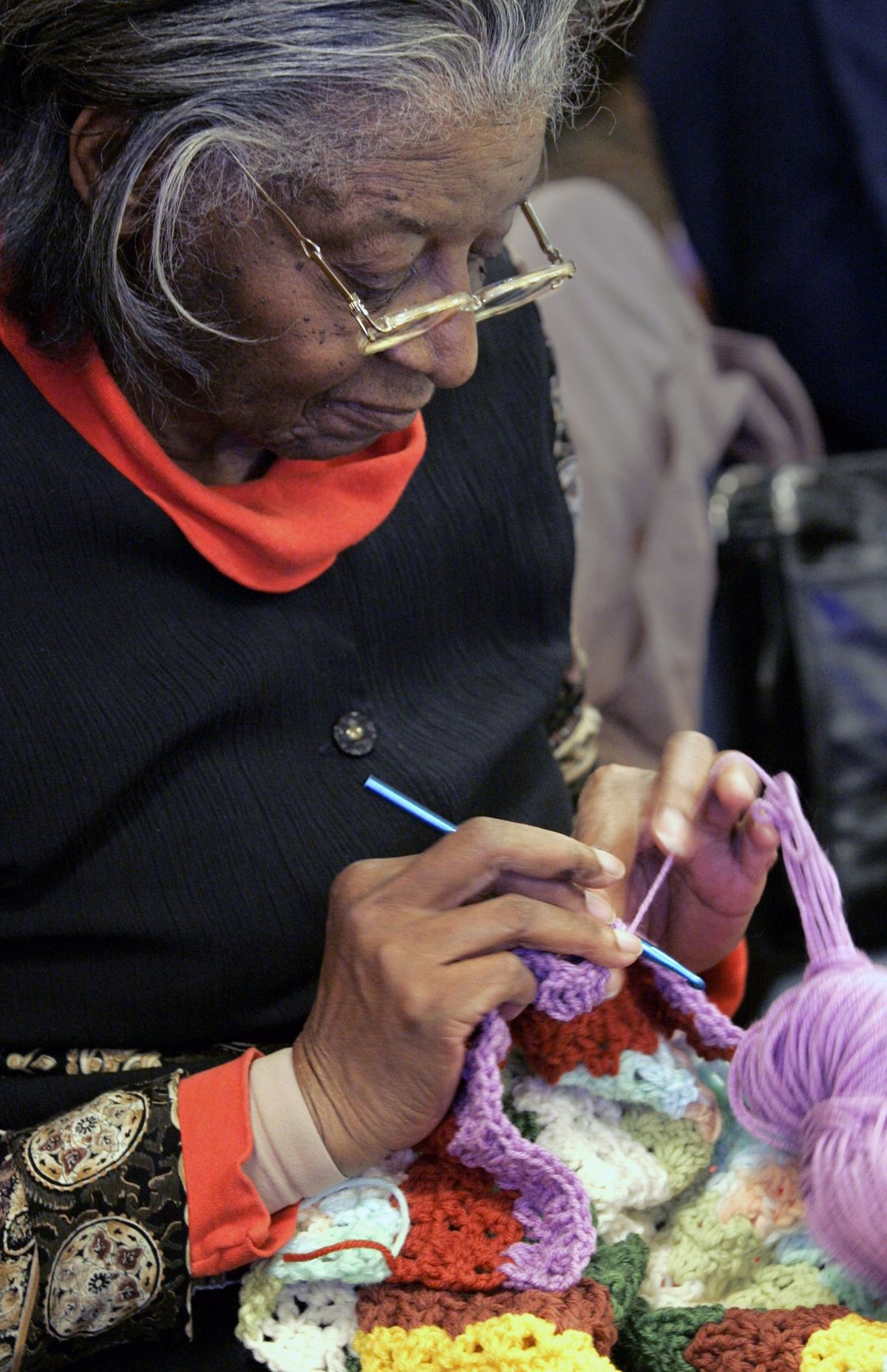 Arlene Long, 78, is among a group knitting and crocheting in the Trinity United Methodist Church parlor on Feb. 8 in Kansas City, Kan.