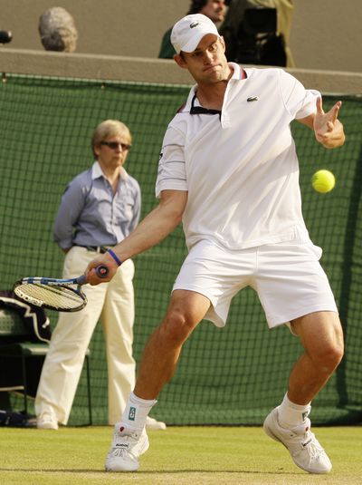 Andy Roddick returns to Philipp Kohlschreiber during their match on Friday. (Associated Press)
