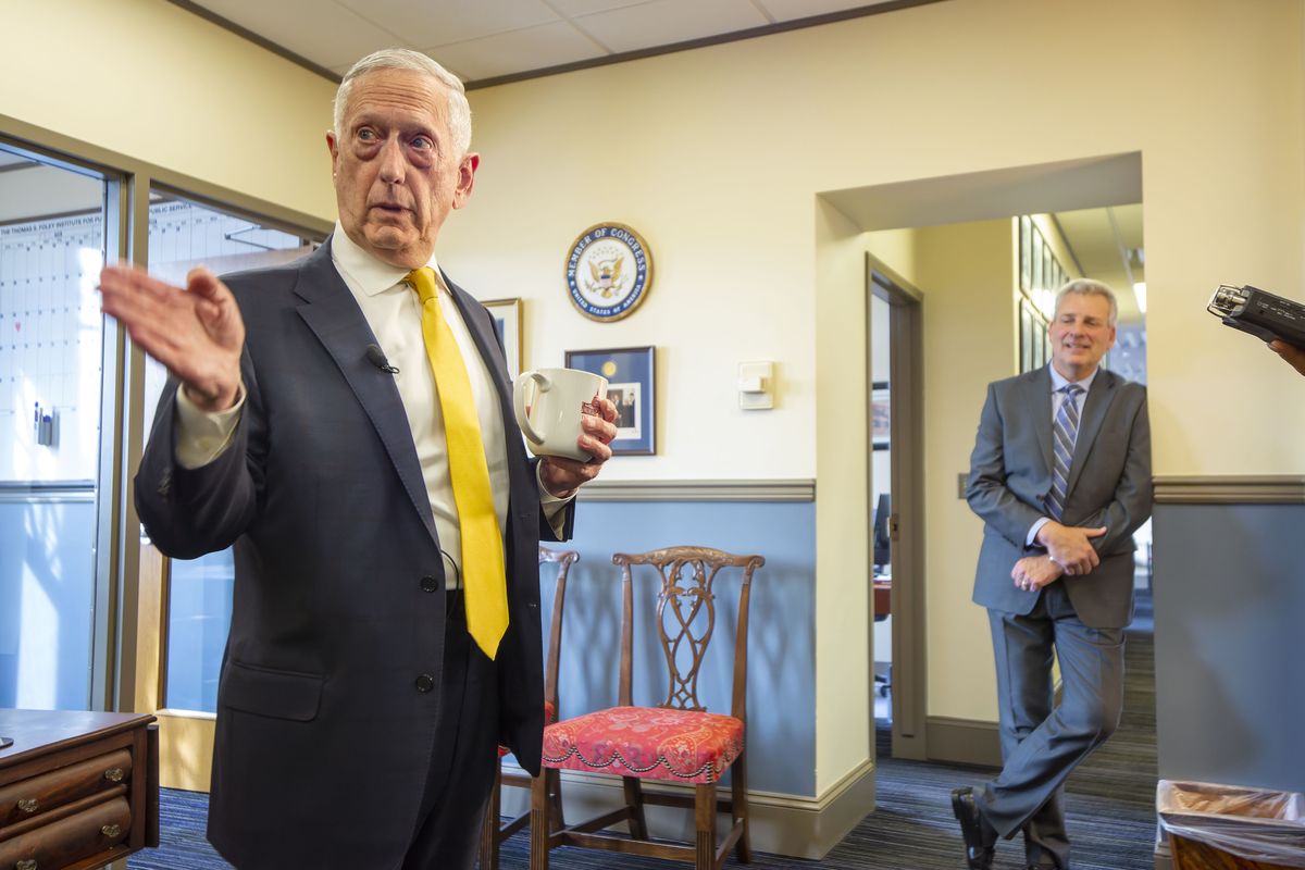 Former U.S. Secretary of Defense James Mattis, left, talks during a news conference on Thursday at the Thomas S. Foley Institute for Public Policy and Public Service at WSU in Pullman. At right is Cornell Clayton, director of the Foley Center.  (Geoff Crimmins/For The Spokesman-Review)