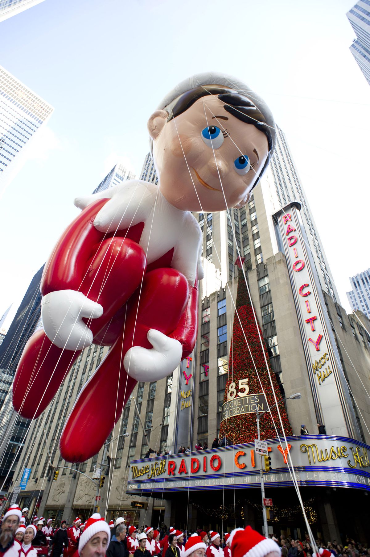 The Elf on the Shelf balloon floats in the Macy