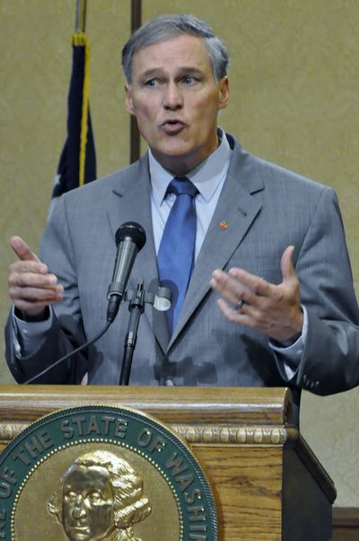 OLYMPIA -- Gov. Jay Inslee answers questions Thursday during his first press conference since taking the oath of office on Wednesday. 
 (Jim Camden)