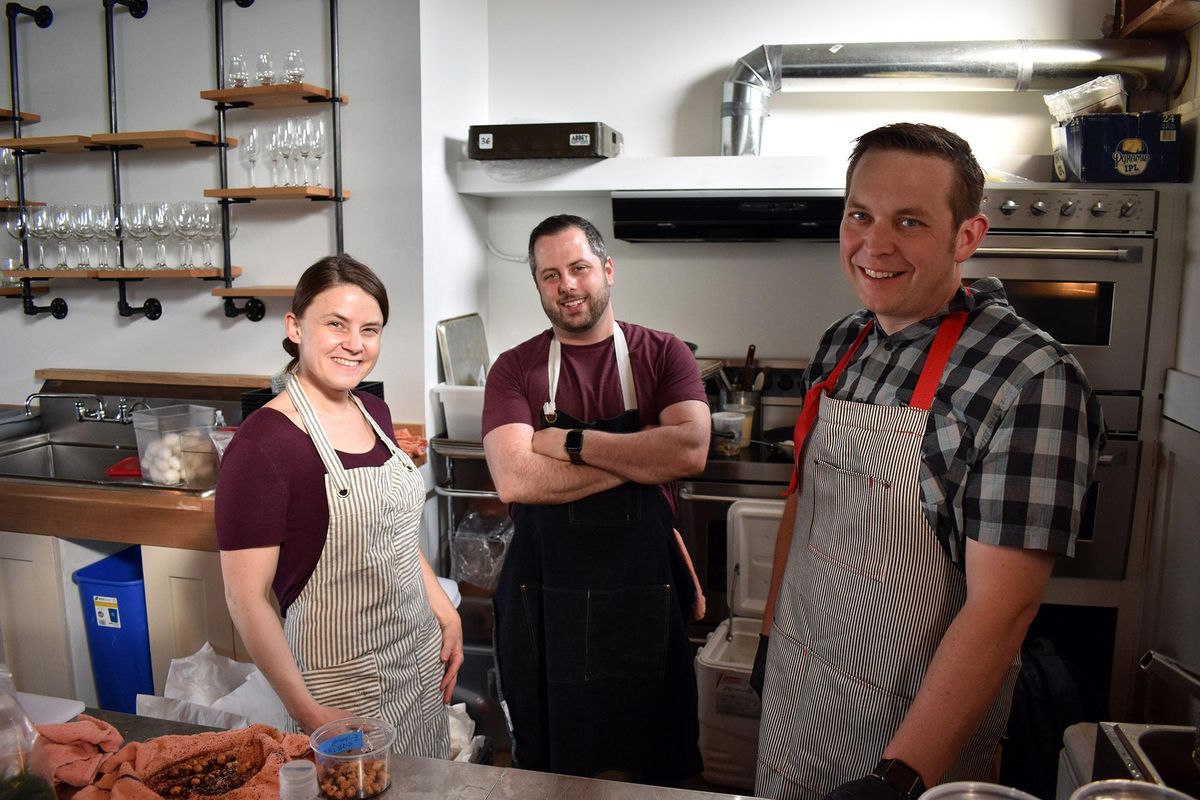 Chefs Emily Crawford, Aaron Fish and Adam Hegsted pose for a photo before the Crave Food and Drink Celebration dinner in Seattle on Wednesday, May 29, 2019. (Don  Chareunsy / The Spokesman-Review)