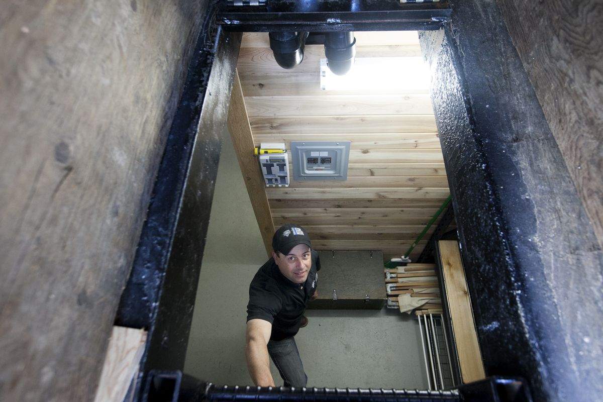 John Camp of Custom Survival Bunkers poses for a photo inside his display bunker on Friday in Mead. (Tyler Tjomsland)