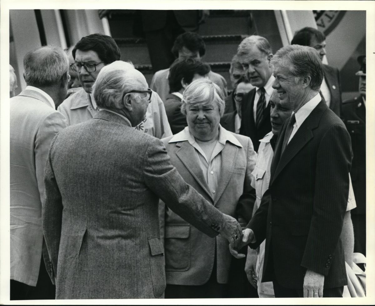 L-R (facing camera) John Evans, (Idaho Gov) Dixey Lee Roy, Tom Foley (background), Ron Bair (Spo. mayor) and Jimmy Carter in Spokane after Mt. St. Helens eruption