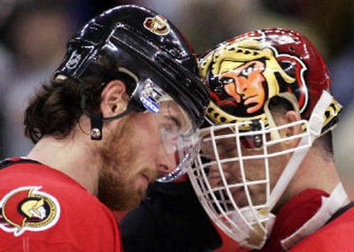
Ottawa's Martin Havlat, left, greets Dominik Hasek after a win over Tampa Bay. 
 (Associated Press / The Spokesman-Review)