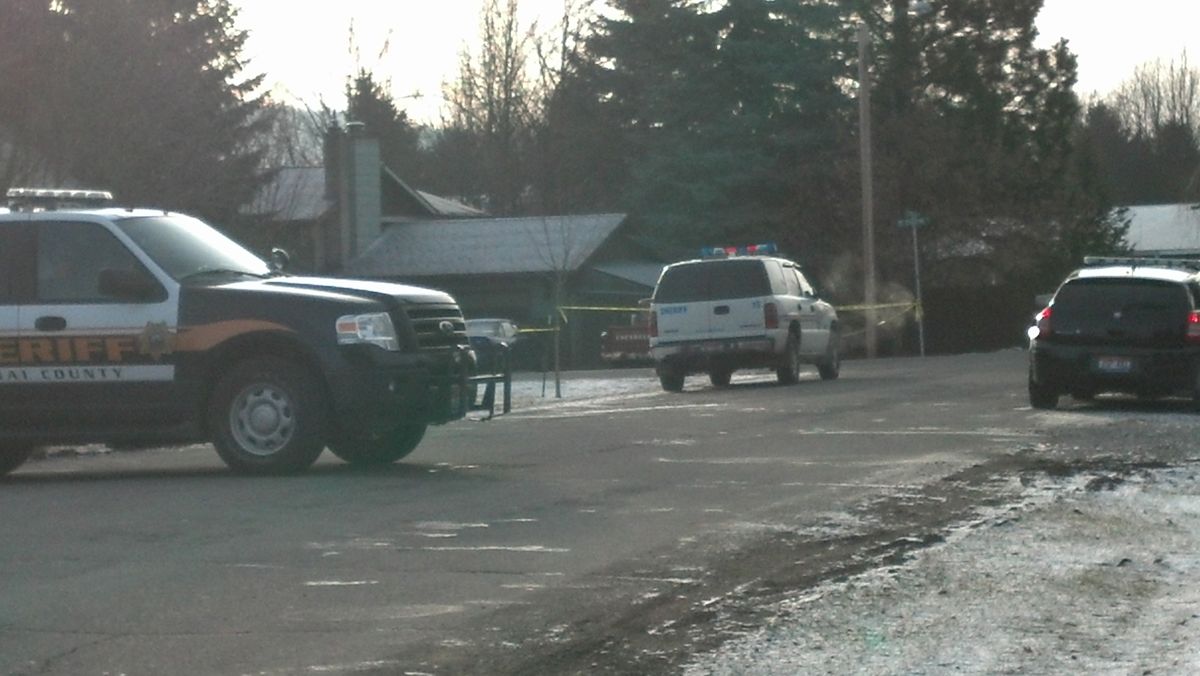 Law enforcement vehicles remain stationed at the scene of an officer-involved shooting that left one man dead early this morning in Hayden. (Kathy Plonka)