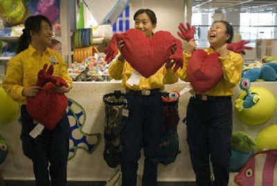 
Chinese IKEA staff rehearse a play Monday to entertain young customers ahead of Wednesday's grand opening of the newly completed IKEA Siyuanqiao store in Beijing. 
 (Associated Press / The Spokesman-Review)