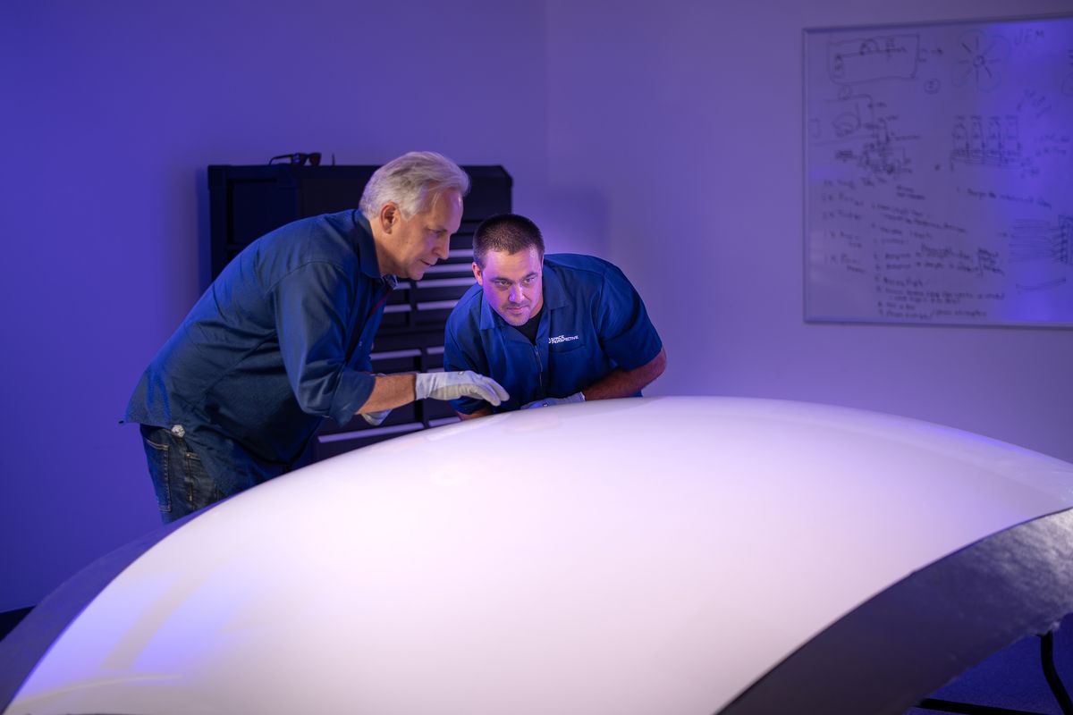 Space Perspective founder, CTO and Co-CEO Taber MacCallum with Neptune spacecraft manufacturing specialist Peter Tinkham seen with the capsule skin planned for the Spaceship Neptune.   (Space Perspective/TNS/TNS)
