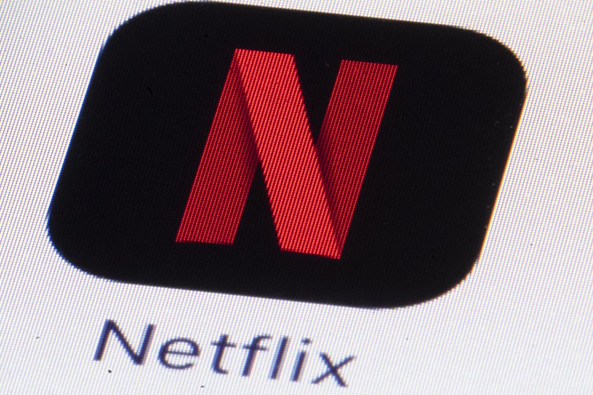FILE - This Monday, July 17, 2017, file photo shows the Netflix logo on an iPhone in Philadelphia. Streaming services ranging from Netflix to Disney+ want us to stop sharing passwords. That's the new edict from the giants of streaming media, who hope to discourage the common practice of sharing account passwords without alienating their subscribers, who've grown accustomed to the hack.  (Matt Rourke)
