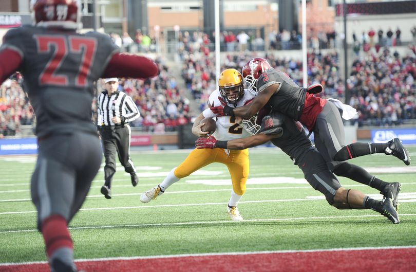 WSU’s Shalom Luani (18) and Ivan McLennan (3) stop Arizona State quarterback Mike Bercovici (2) on a 4th-and-goal attempt during the first half of a Pac-12 college football game on Saturday, Nov 7, 2015, at Martin Stadium in Pullman, Wash. (Tyler Tjomsland / The Spokesman-Review)