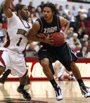 Associated Press Gonzaga’s Steven Gray drives to the basket in first-half action. (Associated Press)
