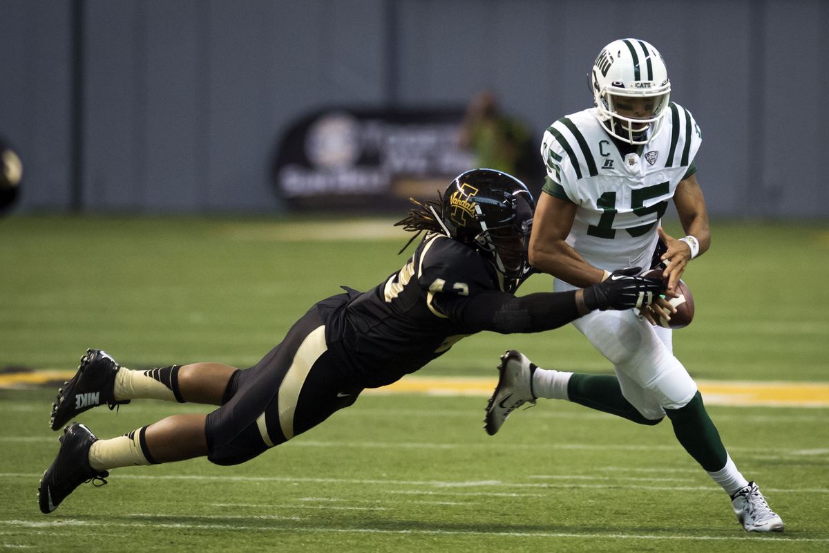 Vandals DE Quinton Bradley strips ball from Bobcats QB Derrius Vick. Idaho punted three plays after forcing Ohio’s only turnover of game. (Colin Mulvany)