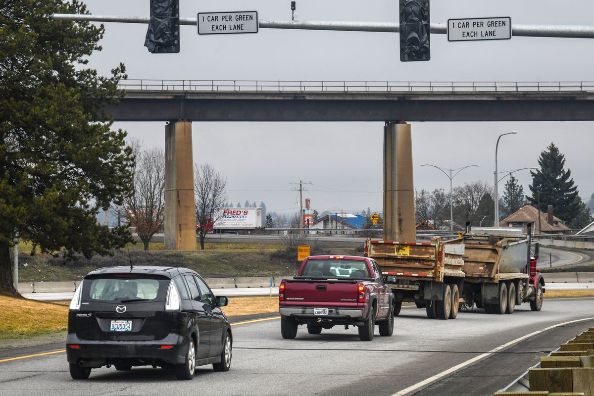 Motorists drive under the ramp meter where northbound U.S. Highway 195 joins eastbound I-90 in this March 2019 photo.  (Dan Pelle/The Spokesman-Review)
