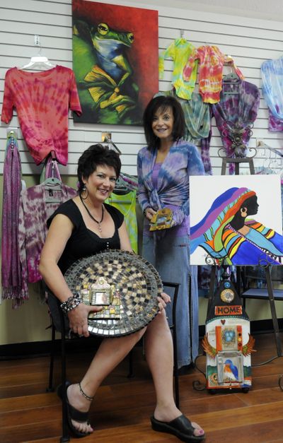 Hair stylist Debbie McCulley, left, and Bert McCollum, stylist and owner of Shear Illusions, are hosting Art on Broadway, in the parking lot of the salon, Sept. 10. More than 20 local artists will be represented, including McCollum’s tie-dyed fashions, McCulley’s paintings, paintings by Arlene Mork, mixed media by Kathy Mork, and glass work by Amy Galbavy. (J. Bart Rayniak)