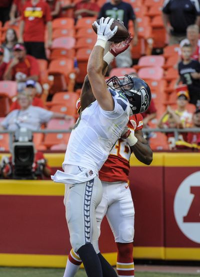 Seattle Seahawks defensive back Tanner McEvoy, front, makes a touchdown catch in the end zone in front of Kansas City Chiefs defensive back Malcolm Jackson (48) during the second half of an NFL preseason football game in Kansas City, Mo., Saturday, Aug. 13, 2016. (AP Photo/Ed Zurga) ORG XMIT: MONH138 (Ed Zurga / AP)