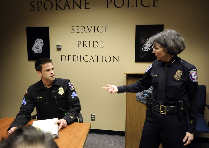 Spokane police Chief Anne Kirkpatrick credits two officers, including Sgt. Eric Olsen, left, with  steering the  Unity March on Martin Luther King Jr. Day away from  an explosive device in downtown Spokane.  (Dan Pelle)