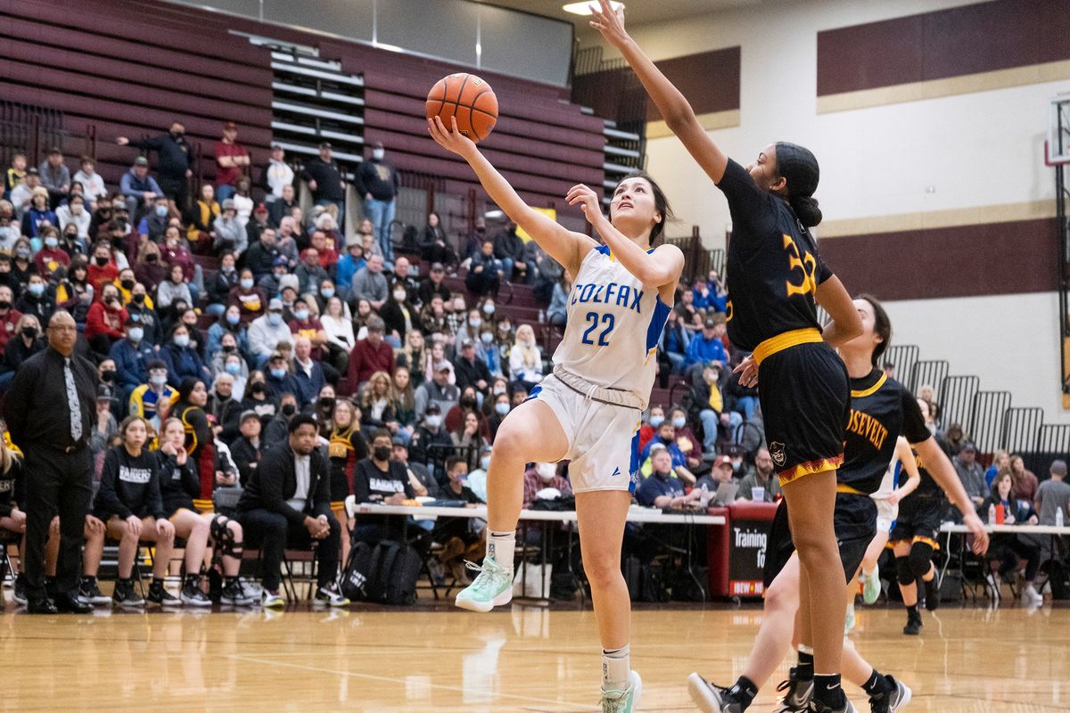 Colfax’s Asher Cai shoots over Lake Roosevelt’s Zalissa Finley during a State 2B regional on Friday at U-Hi.  (Madison McCord/For The Spokesman-Review)