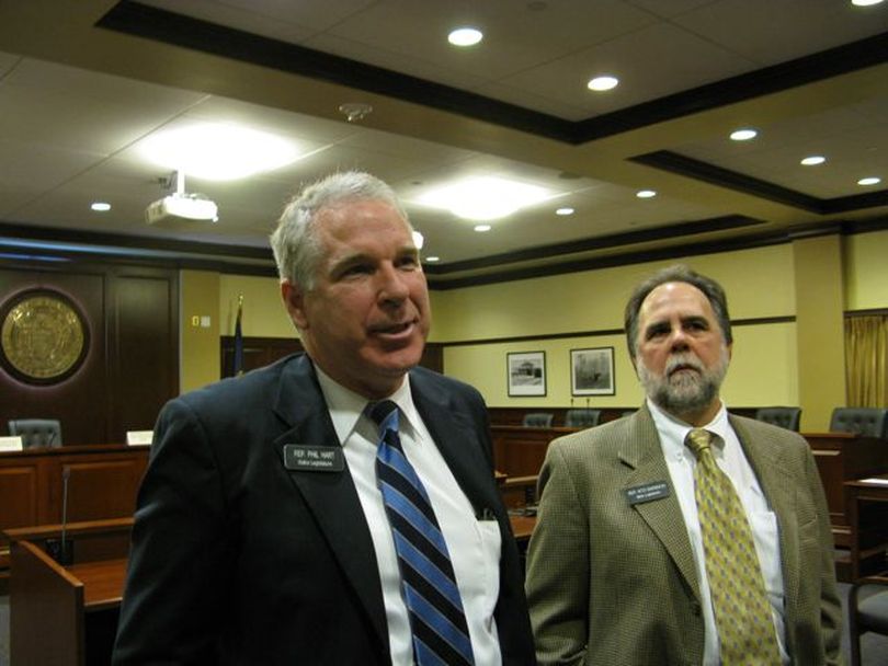 Rep. Phil Hart, R-Athol, talks with reporters after a House Ethics Committee on Friday dismissed a complaint against him in exchange for his decision to give up his committee vice-chairmanship. At right is Rep. Vito Barbieri, R-Dalton Gardens, a Hart supporter. (Betsy Russell)