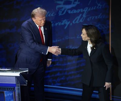 Republican presidential nominee, former U.S. President Donald Trump, and Democratic presidential nominee, U.S. Vice President Kamala Harris, greet as they debate for the first time during the presidential election campaign at The National Constitution Center on Sept. 10 in Philadelphia.  (Win McNamee/Getty Images North America/TNS)