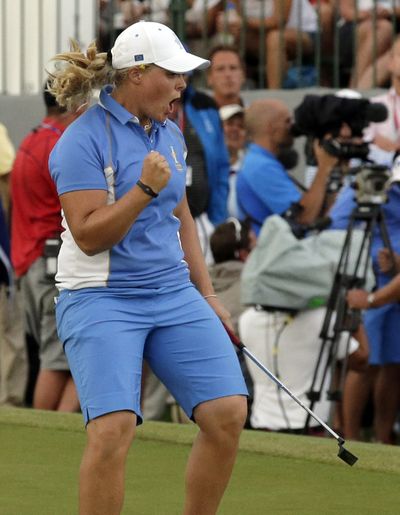 Europe’s Caroline Hedwall clinches Solheim Cup with a birdie putt on hole No. 18. (Associated Press)