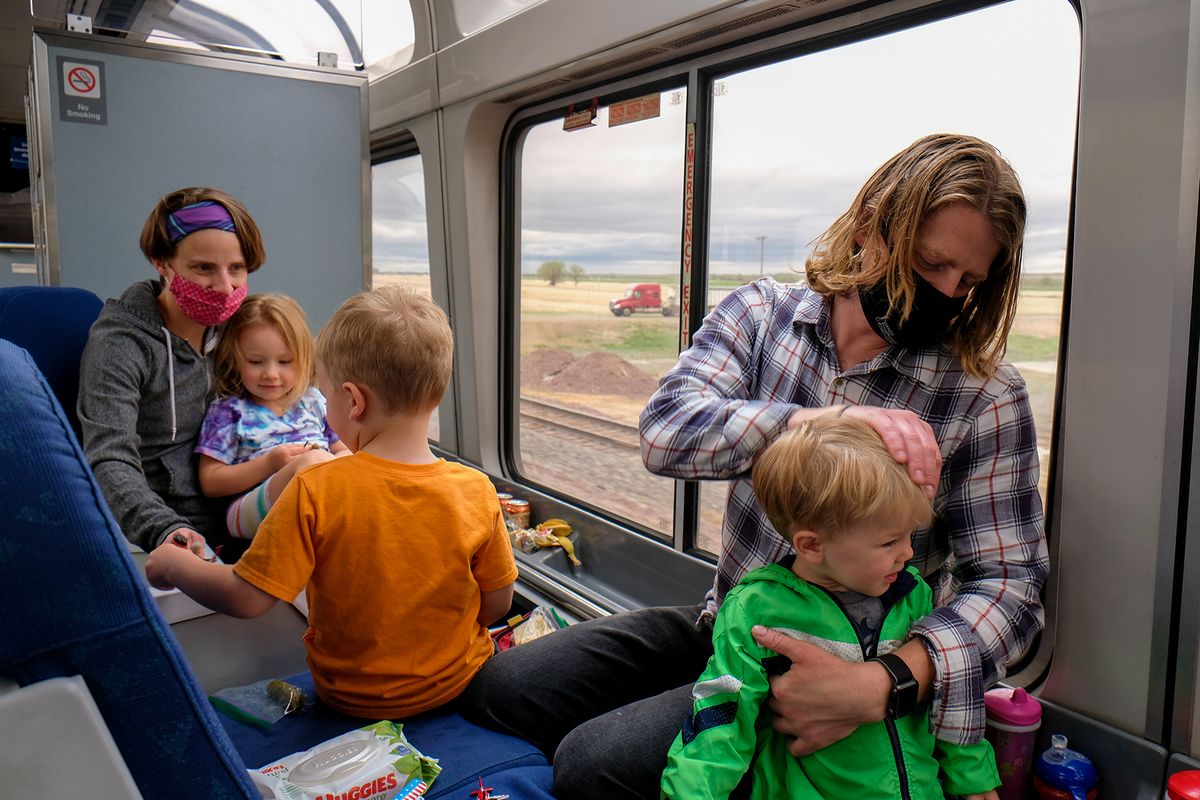 Athena Larsen, her daughter Ryann, her brother Josh Medlin, and Josh’s sons Sampson and Jericho ride the Empire Builder from Minot, N.D. to Vancouver, Wash. on Tuesday, May 26, 2021.  (ORION DONOVAN-SMITH/THE SPOKESMAN-REVIEW)