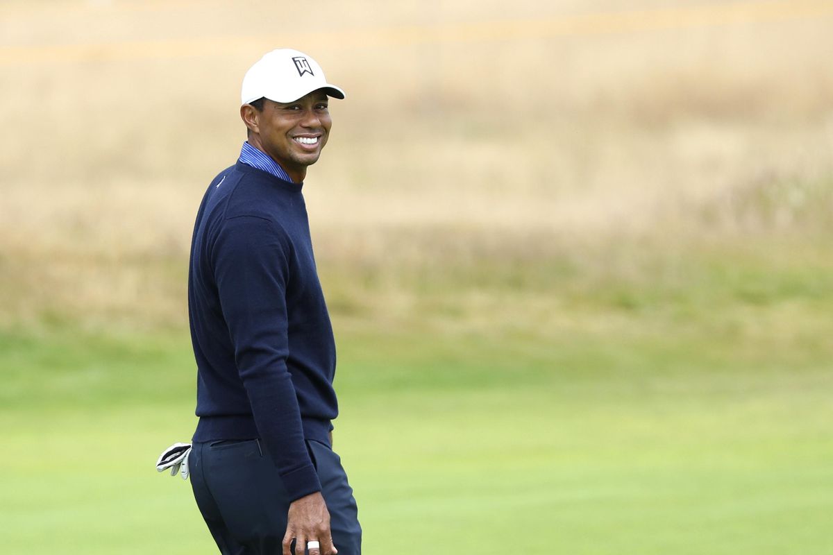 Tiger Woods of the U.S. smiles during a practice round for the 147th British Open Golf championships in Carnoustie, Scotland, on Tuesday. (Peter Morrison / AP)