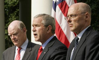 
President Bush on Tuesday announces Henry M. Paulson Jr., right, will replace John Snow, left, as Treasury secretary. Paulson is the chairman of investment banker Goldman Sachs. 
 (Associated Press / The Spokesman-Review)