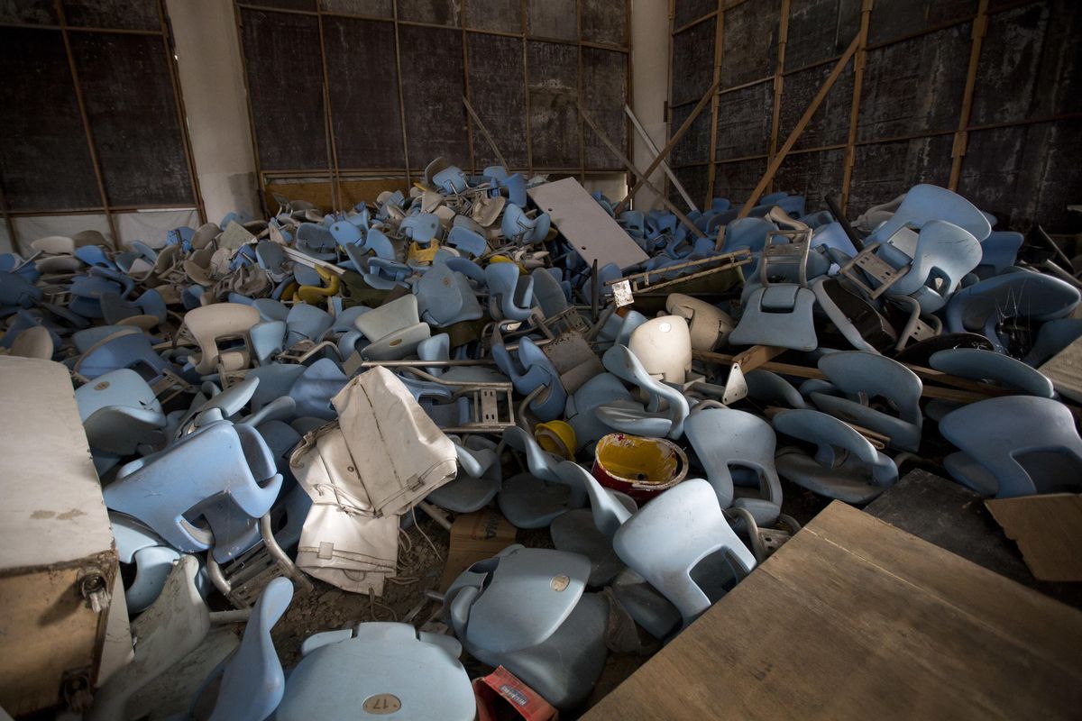 FILE – This Feb. 2, 2017 file photo shows seats jumbled in a pile inside Maracana stadium, the historic stadium, site of the opening and closing ceremony, in Rio de Janeiro, Brazil. A federal prosecutor looking into last year’s Rio de Janeiro Olympics says many of the venues “are white elephants” that were built with “no planning.” (Silvia Izquierdo / AP)