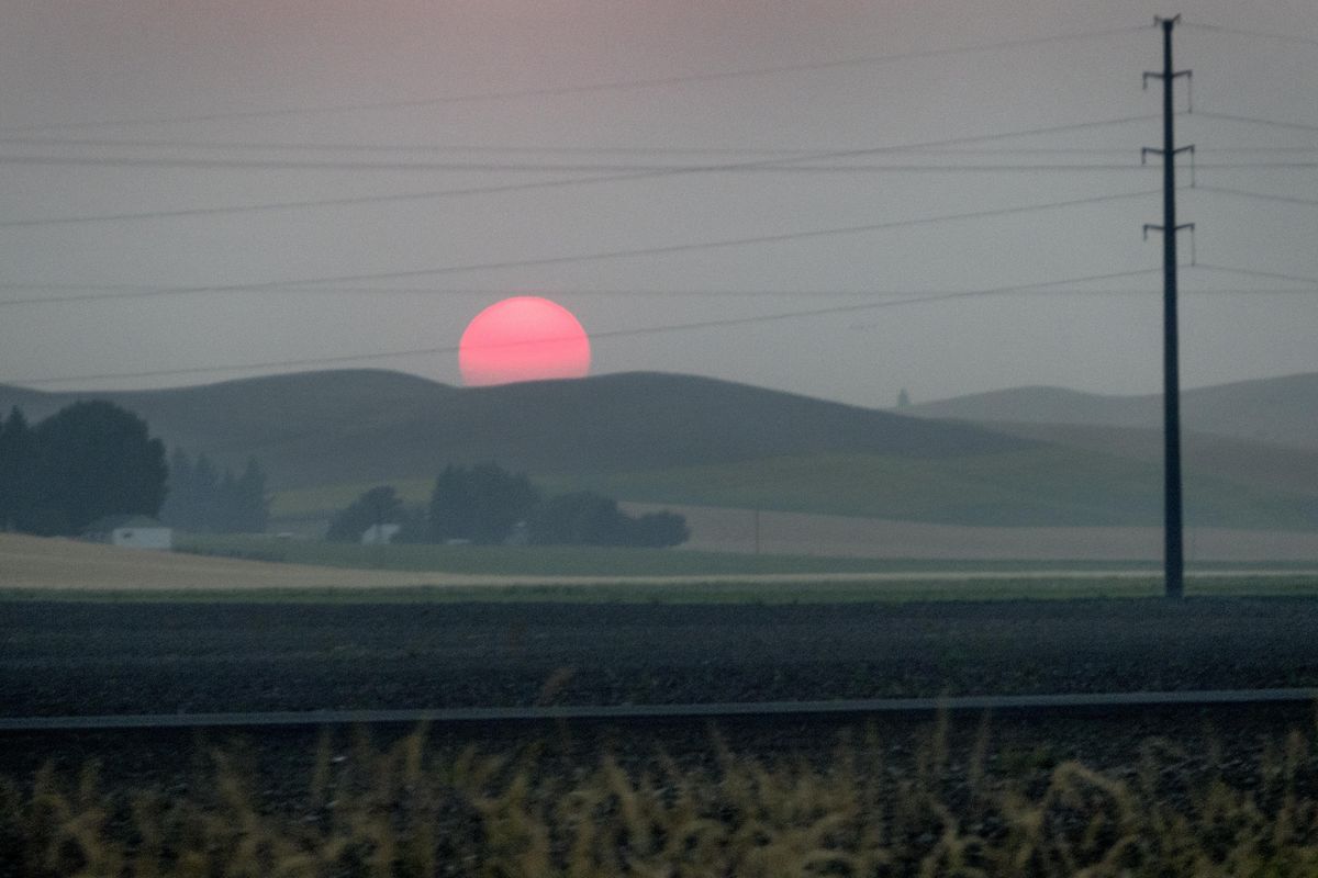 Fire smoke in the skies have given our region spectacular red sunsets, but also unhealthy air. This sunset was over the Palouse Wednesday, Aug. 3, 2017.   Jesse Tinsley/THE SPOKESMAN-REVIEW (Jesse Tinsley / The Spokesman-Review)