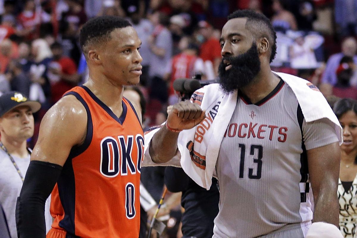 In this March 26, 2017 file photo, Oklahoma City Thunder’s Russell Westbrook (0) and Houston Rockets’ James Harden (13) talk on the court after an NBA basketball game in Houston. The playoffs start Saturday, with a series matching MVP candidates Russell Westbrook and James Harden the highlight of the first round. (Michael Wyke / Associated Press)