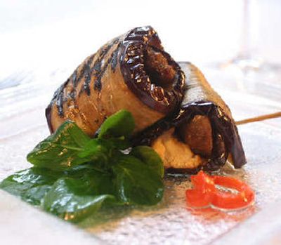 
This apple tart is thin and crusty with genuine vanilla flavor from the seeds of a vanilla bean.
 (King Features Syndicate / The Spokesman-Review)