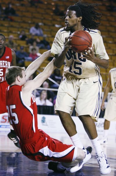 ORU’s Dominique Morrison, right, has 22 career 20-point games. (Associated Press)
