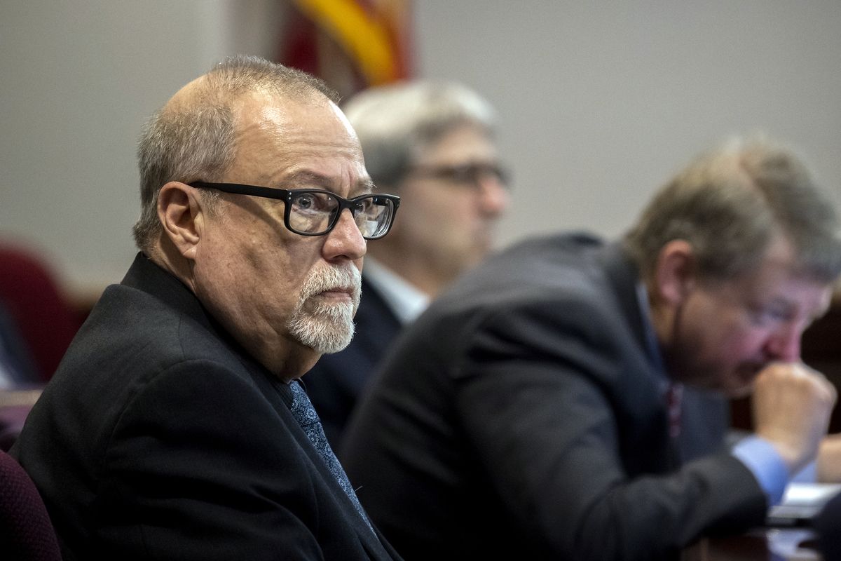 Greg McMichael. left, listens to jury selection for the trial of him and his son, Travis McMichael, and a neighbor, William "Roddie" Bryan, at the Glynn County Courthouse, Monday, Oct. 25, 2021, in Brunswick, Ga. The three are charged with the February 2021 slaying of 25-year-old Ahmaud Arbery.  (Stephen B. Morton)