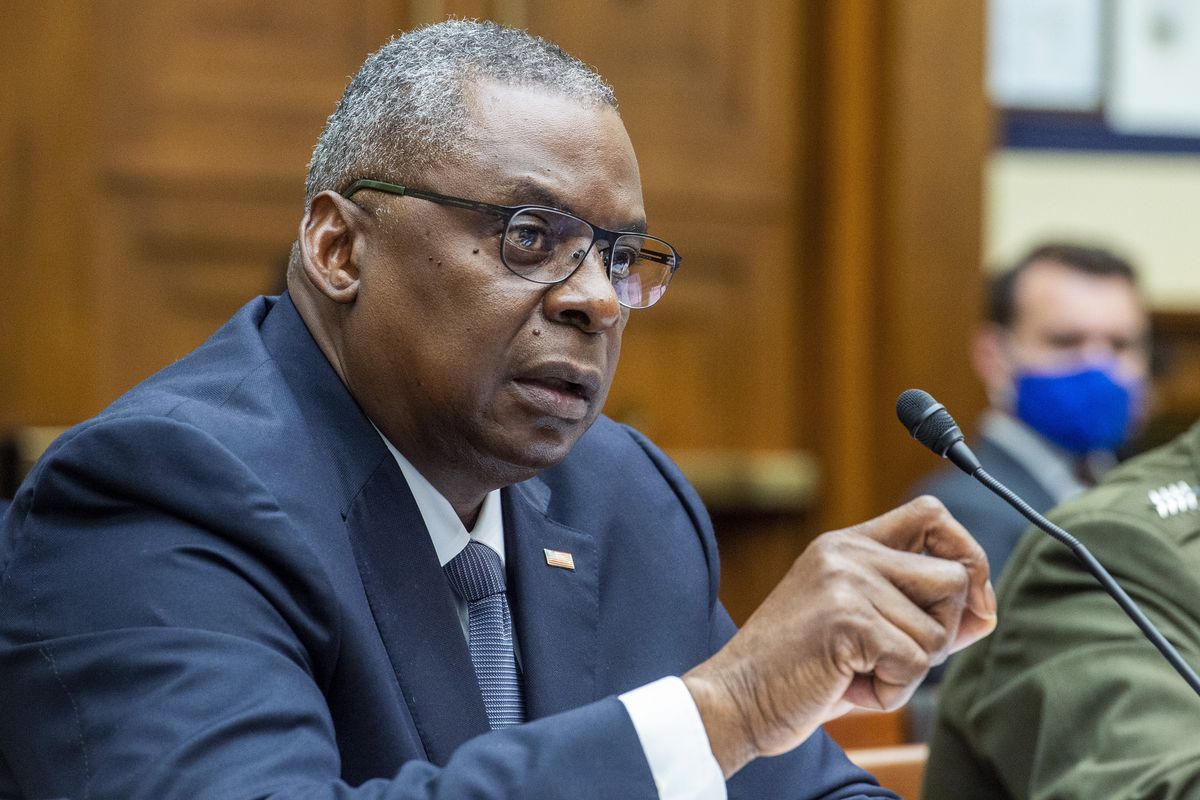 In this Sept. 29, 2021 photo, Defense Secretary Lloyd Austin testifies before the House Armed Services Committee on Capitol Hill in Washington. A new Pentagon plan calls for incorporating the realities of a hotter, harsher Earth at every level in the U.S. military, from making worsening climate extremes a mandatory part of strategic planning to training troops how to secure their own water supplies and treat heat injury.  (Rod Lamkey)