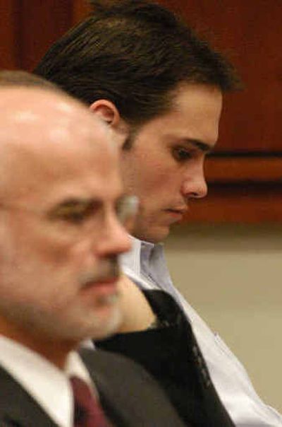 
Erick Hall, right, listens Wednesday as a jury sentences him to death for the Sept. 24, 2000, murder of Lynn Henneman. 
 (Associated Press / The Spokesman-Review)