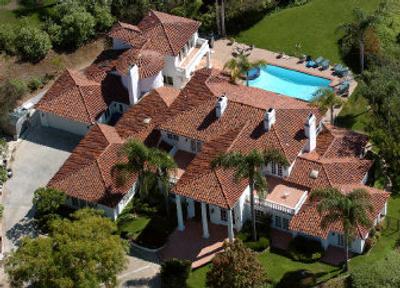 
The California home of Rep. Randy Cunningham is seen in this July 1, 2005, file photo. Cunningham resigned Monday after pleading guilty to taking bribes.
 (File/Associated Press / The Spokesman-Review)