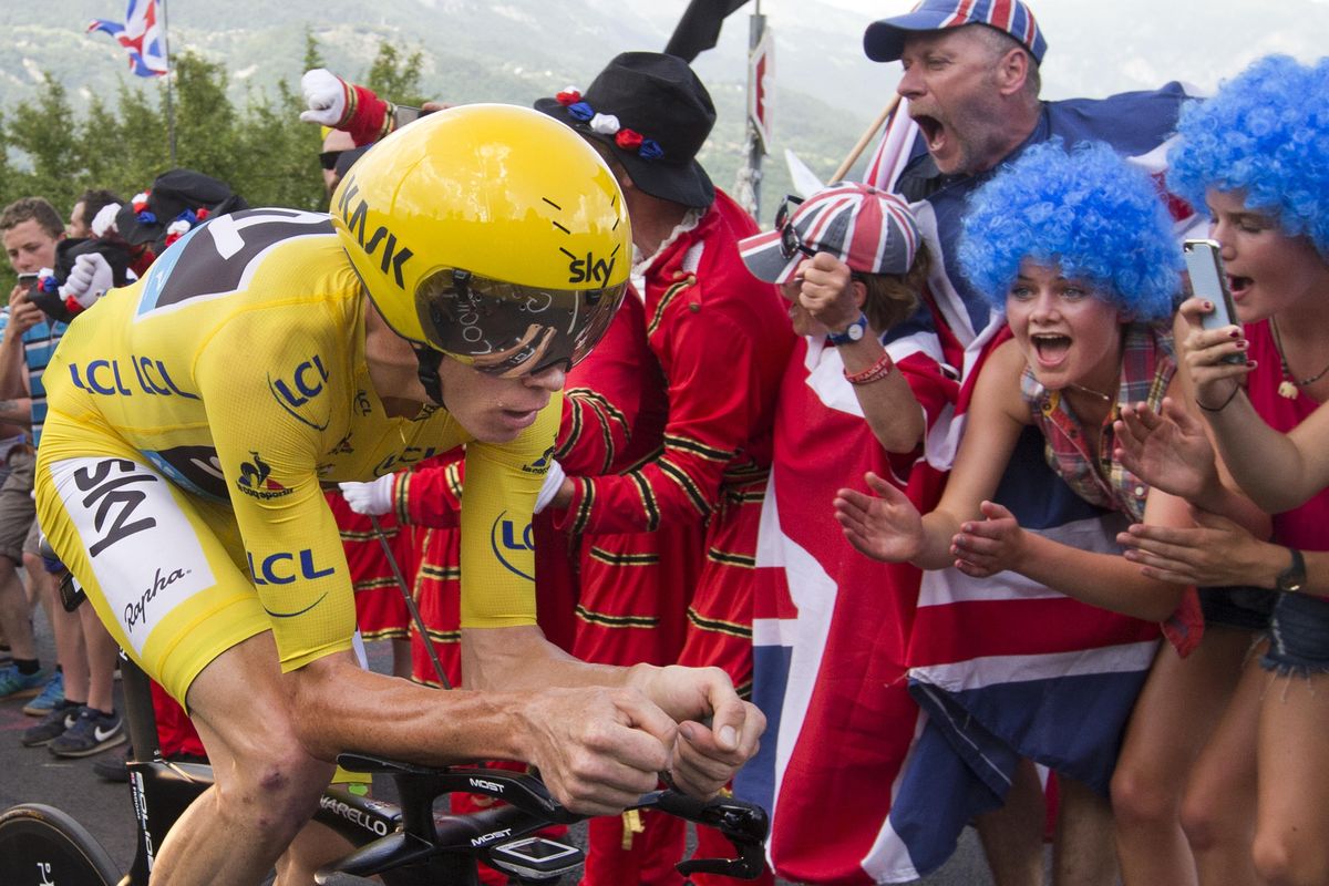 Chris Froome is set to successfully defend his title at the Tour de France on Sunday. (Peter Dejong / Associated Press)