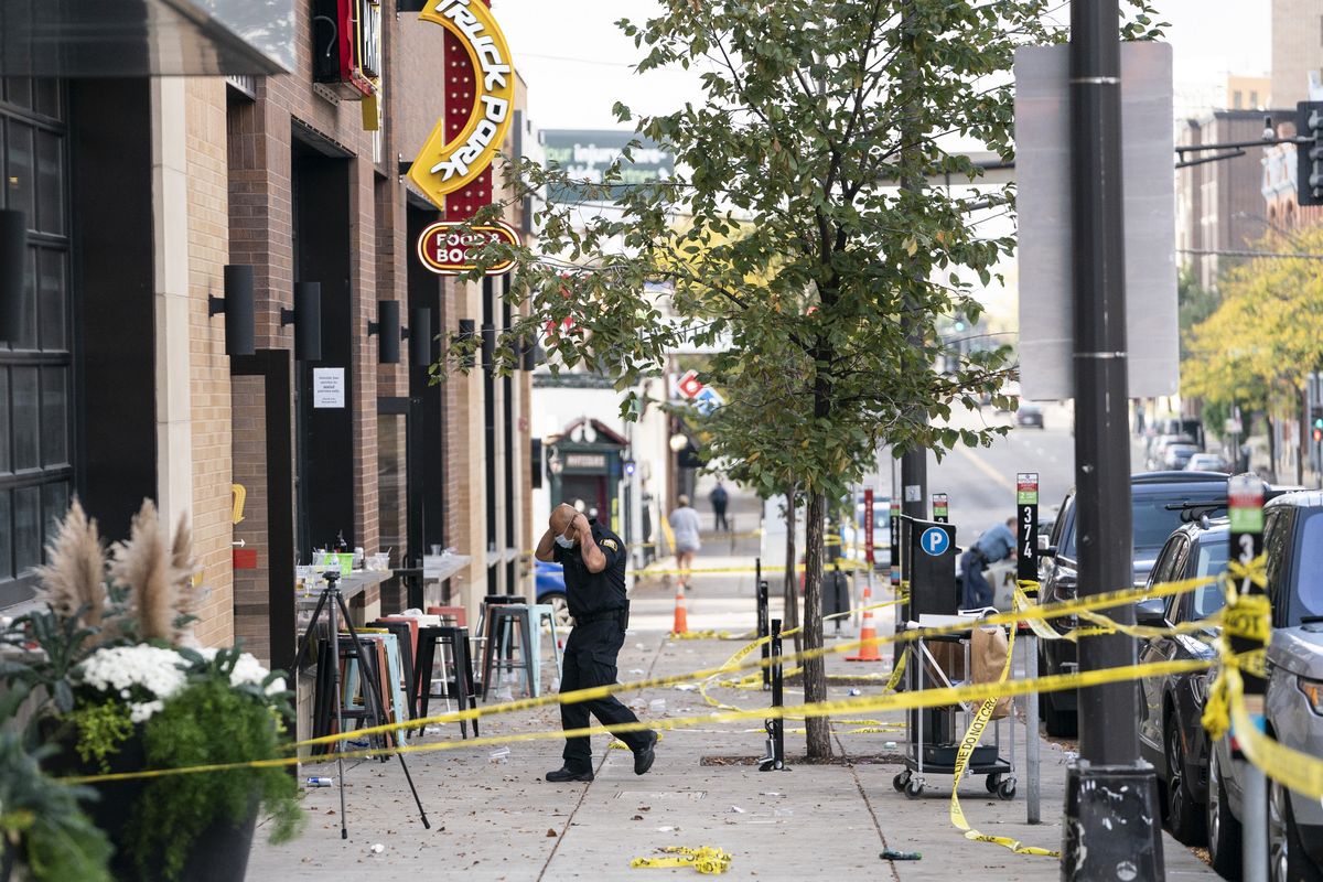 Investigators processed the chaotic scene of a multiple shooting at the bar Truck Park in St. Paul, Minn., that happened after midnight on Sunday, Oct. 10, 2021.  (Renee Jones Schneider)