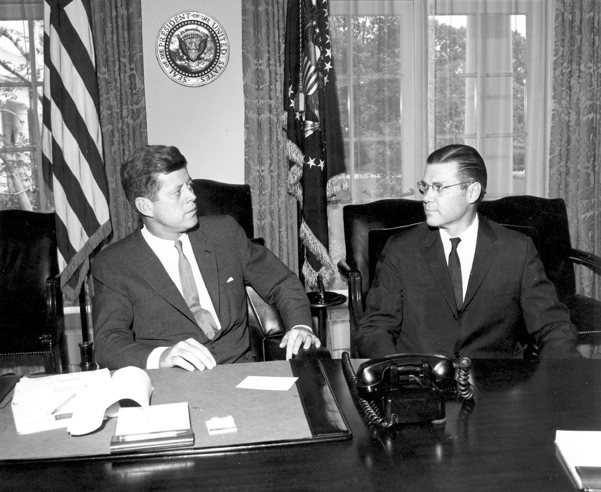 President John F. Kennedy sits with Secretary of Defense Robert S. McNamara in the White House Oval Office in Washington in a Jan. 23, 1961, photo released by the John Fitzgerald Kennedy Library in Boston. (Associated Press / The Spokesman-Review)