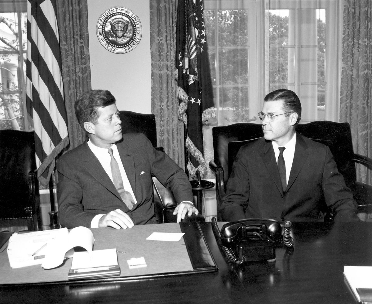 President John F. Kennedy sits with Secretary of Defense Robert S. McNamara in the White House Oval Office in Washington in a Jan. 23, 1961, photo released by the John Fitzgerald Kennedy Library in Boston.  (Associated Press / The Spokesman-Review)