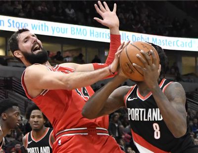 The New Orleans Pelicans acquired forward Nikola Mirotic, left, and a second-round draft pick from the Chicago Bulls on Thursday for center Omer Asik, guards Jameer Nelson and Tony Allen, and a future first-round pick. (David Banks / Associated Press)