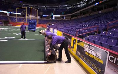 
Spokane Arena crews test the setup for the new football field last week. The arenafootball2 Spokane Shock franchise opens the season Thursday.
 (Christopher Anderson / The Spokesman-Review)