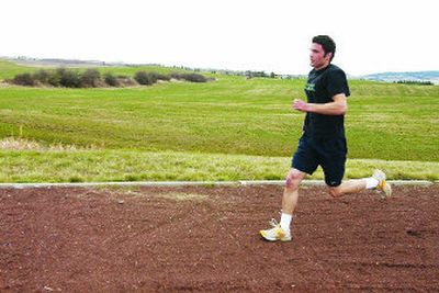 
Freeman Senior  Greg Emtman works out on the cinder track at the school Monday.  He placed third in the 800 at state and also will run the 400 and on the 4x400 relay team.
 (J. BART RAYNIAK / The Spokesman-Review)