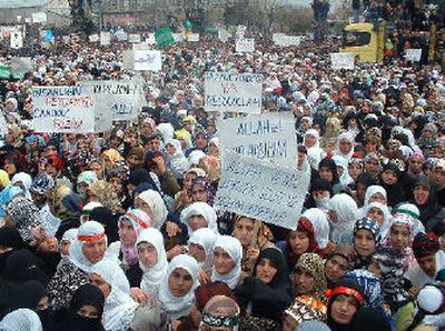 
During a peaceful rally Sunday in the Turkish city of Diyarbakir, thousands of women join at least 30,000 pro-Islamic protesters who shouted slogans to denounce the publication of cartoons of the Prophet Muhammad in some European newspapers. 
 (Associated Press / The Spokesman-Review)