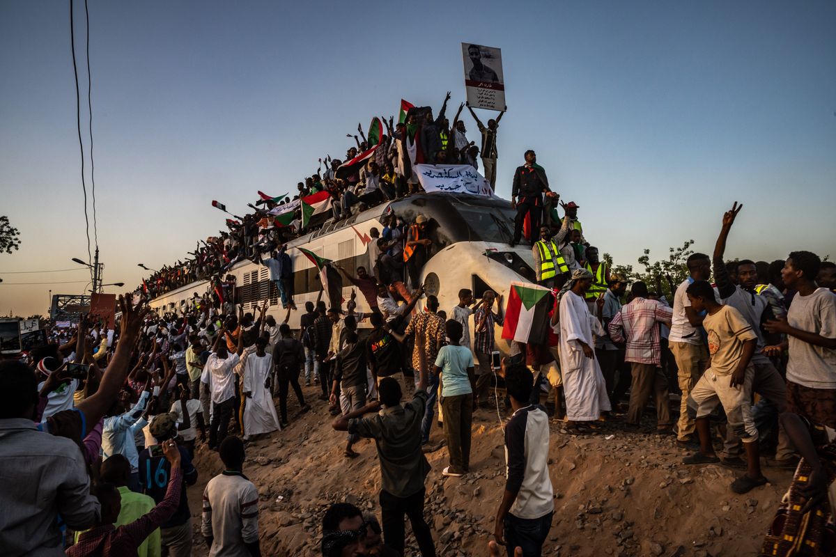 FILE - Protesters arrive in Sudan